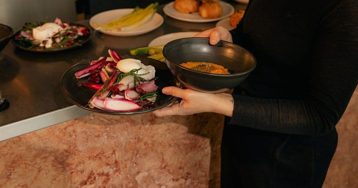 hands, plated food, beetroot salad, sauce bowl